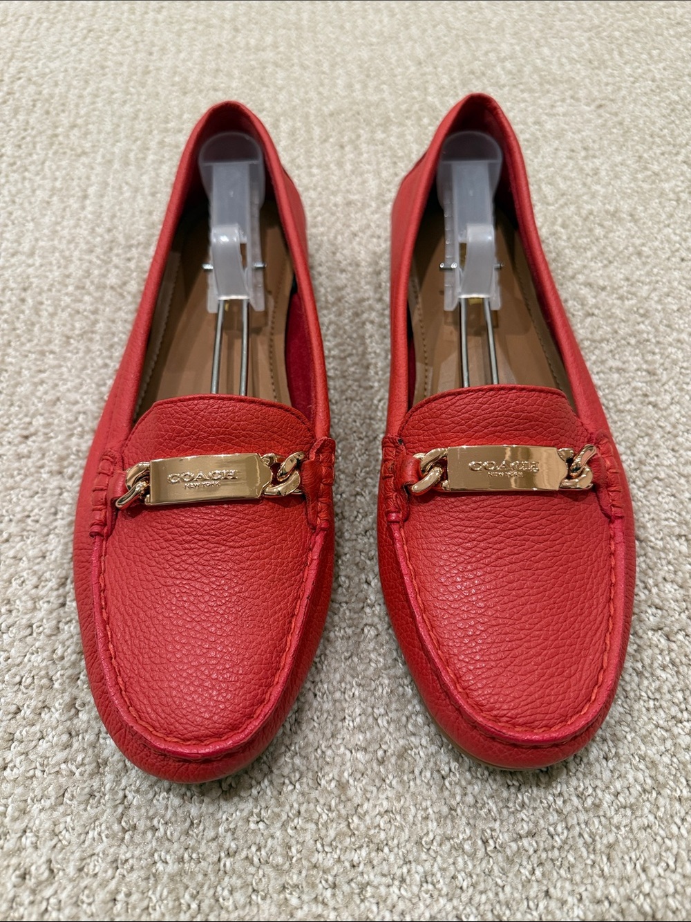 NWOT Coach “Olive” Red Orange Leather Loafers with Gold Plaque